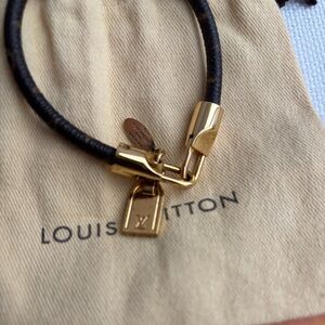 Louis Vuitton Monogram Bracelet with gold charms with dust bag and LV envelope